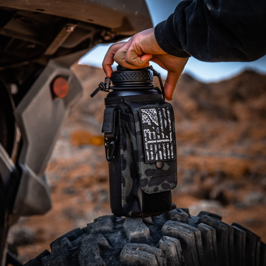 Iron Infidel Battle Bottle - Half Gallon Insulated Stainless Steel Water Jug with Handle - Gym Bottle for Men with Rugged Sleeve (Overland 2 Liter)