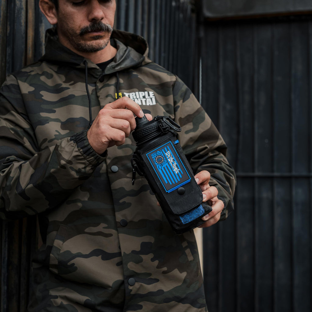 Iron Infidel Battle Bottle - Half Gallon Insulated Stainless Steel Water Jug with Handle - Gym Bottle for Men with Rugged Sleeve (Overland 2 Liter)